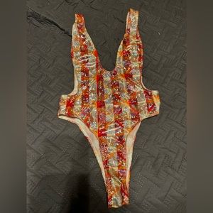 Holographic Orange and silver bodysuit
